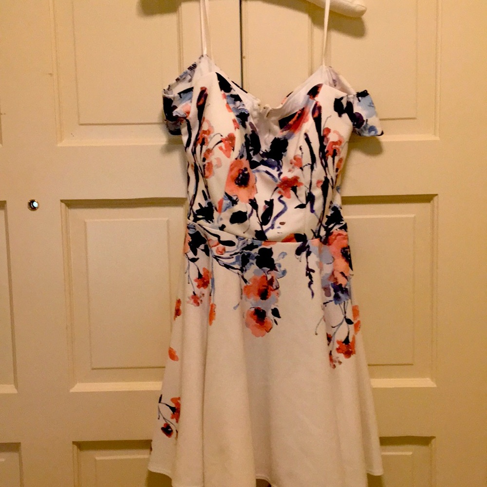 Dress with flower print on cream background size 7